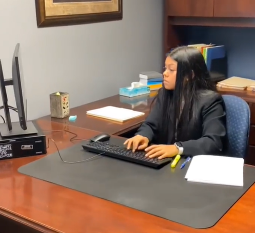 Bianca Jimenez-Ortiz, the youth apprentice for the Elkhart County Prosecutor, works in an office.